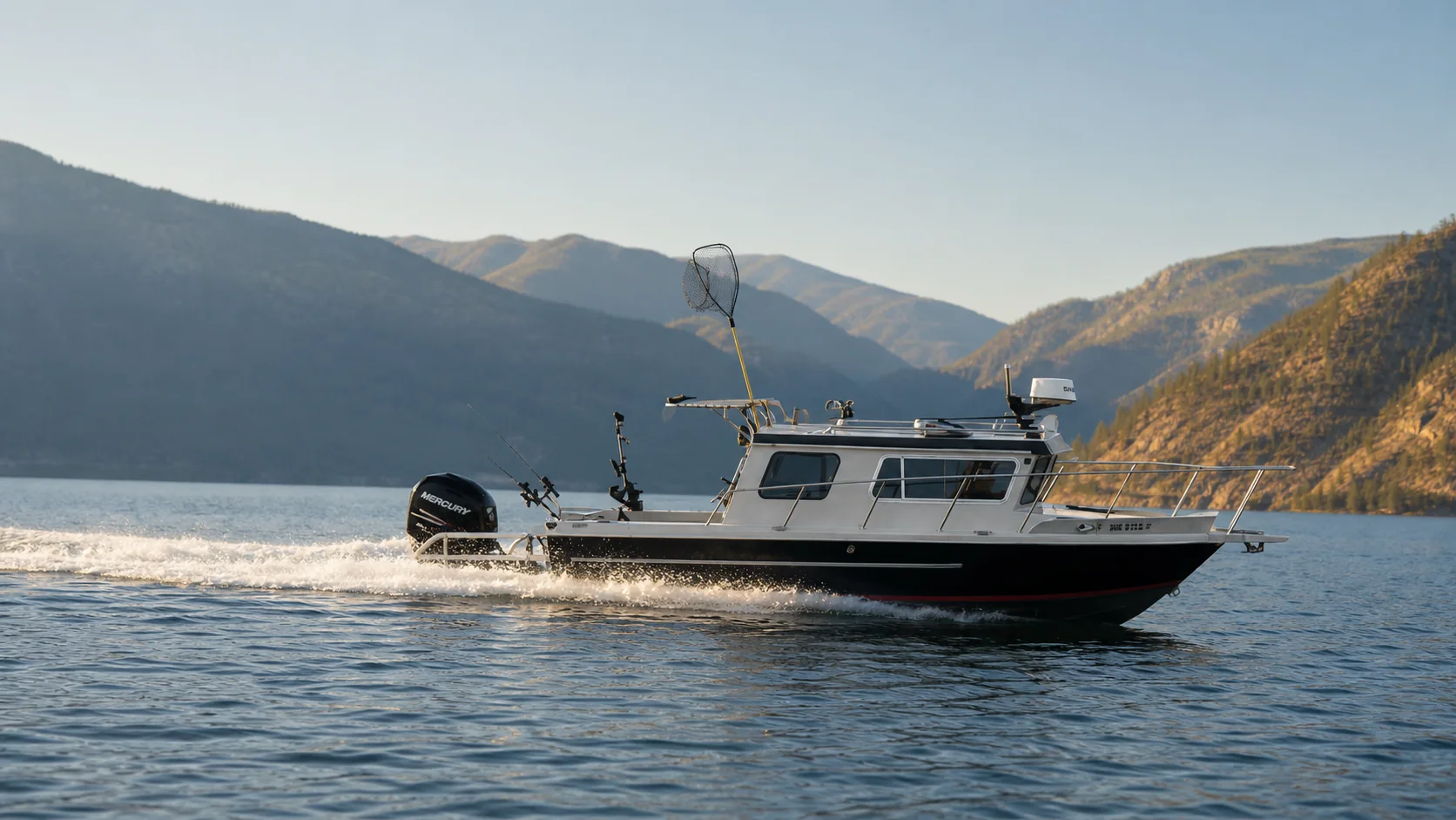 Kingfisher charter boat cruising on Okanagan Lake