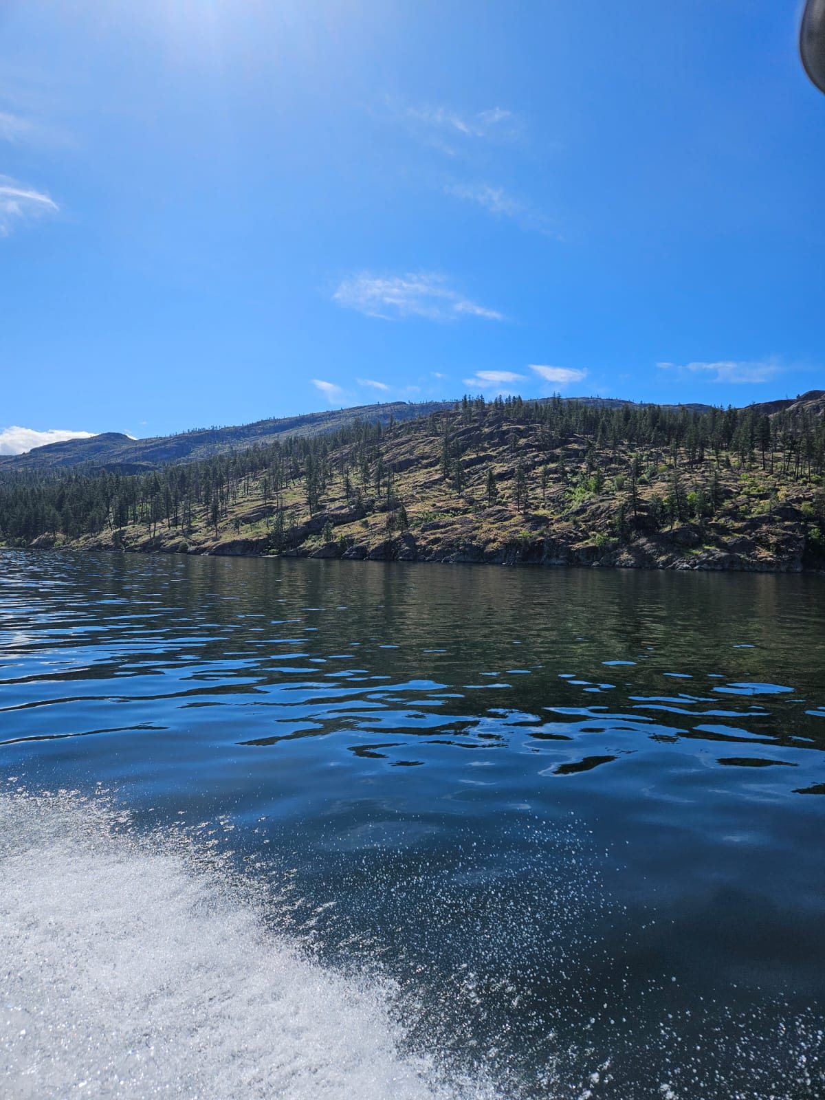 Wake off the stern running across Okanagan Lake