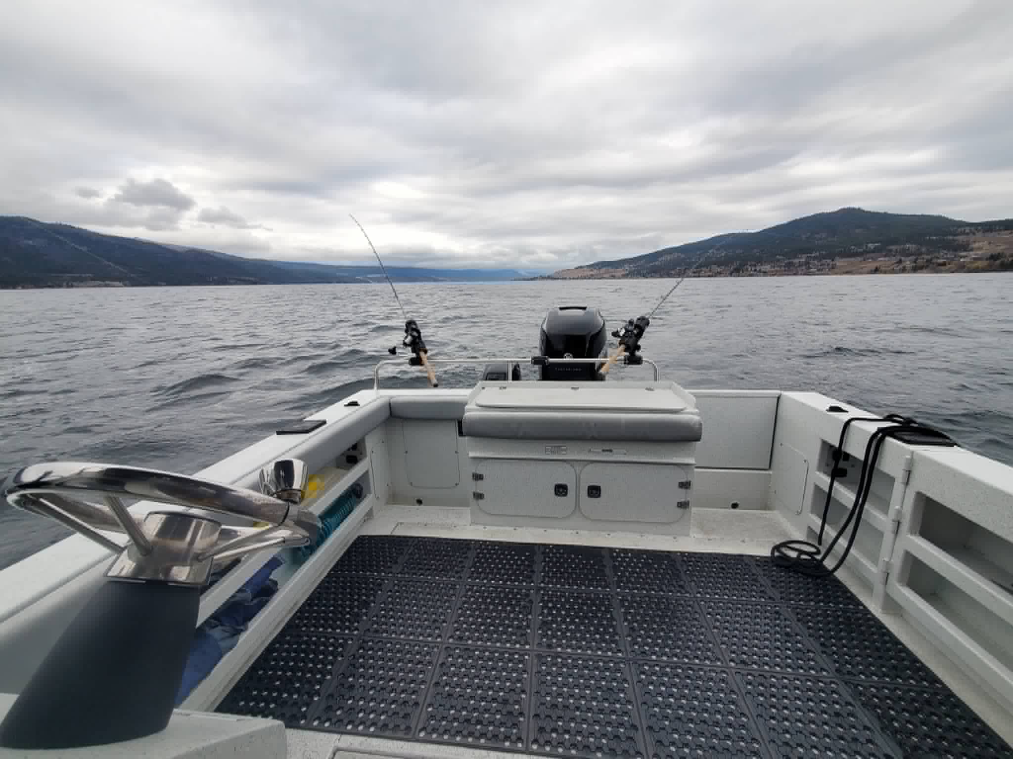 Trolling station on the stern with rods in holders